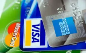 3 credit cards fanned out - Amex, Visa and MasterCard