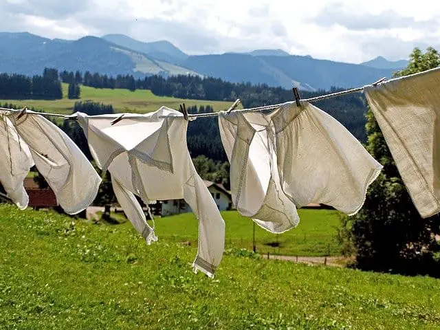 hanging laundry with fields and mountains